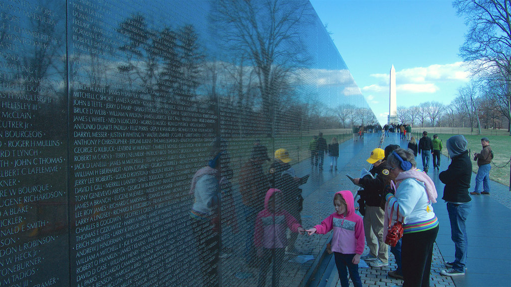 Families beside Vietnam Veterans Memorial